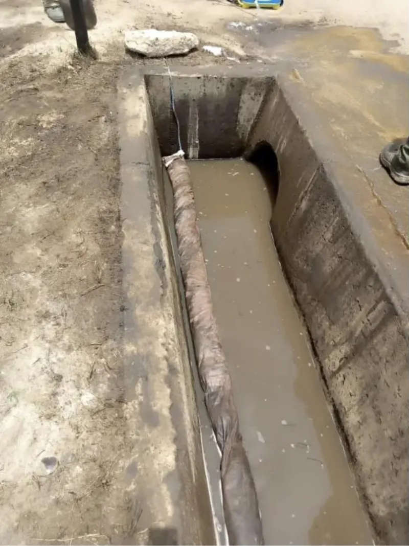 Oil-absorbent boom deployed during a spill clean-up on a client site